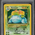 1999 POKEMON BASE SET HOLO VENUSAUR #15 ARITA AUTO 9 PSA 7